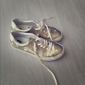 Madewell veja gold sneakers with star design